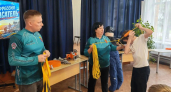 Школьники Киселевска примерили экипировку пожарного